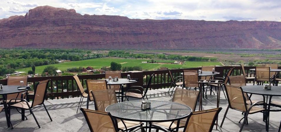 Outdoor dining area, overlooking the red rocks in Moab, Utah.