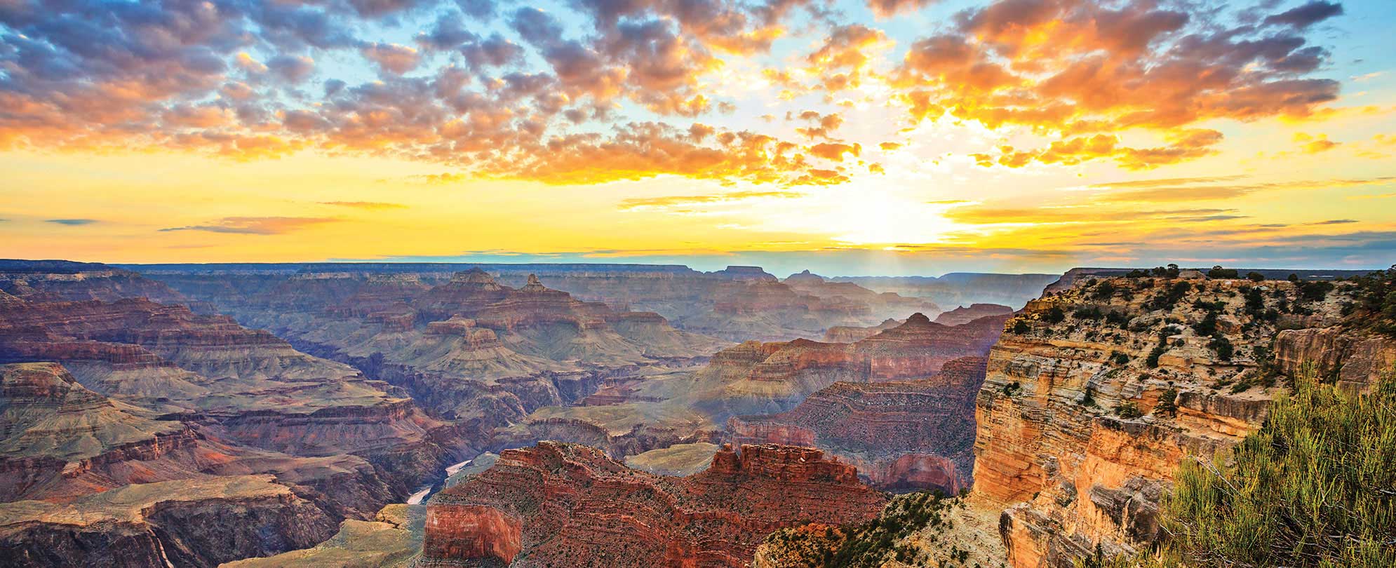 A view of the Grand Canyon National Park at sunset.