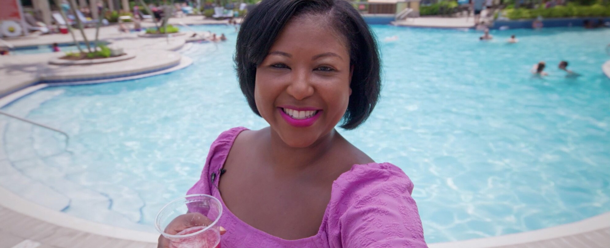 Melody Bostic Brown, enjoying a cocktail on an episode of Vacations Unpacked. 