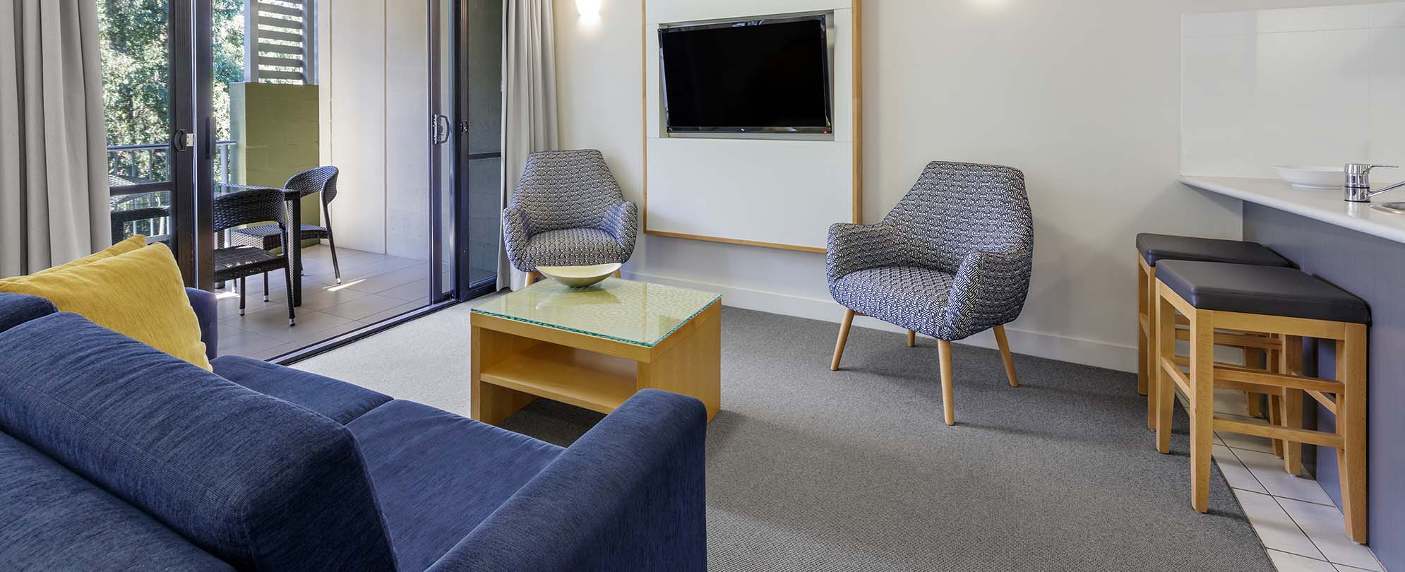 The living area of a 1-bedroom suite at Club Wyndham Coffs Harbor.