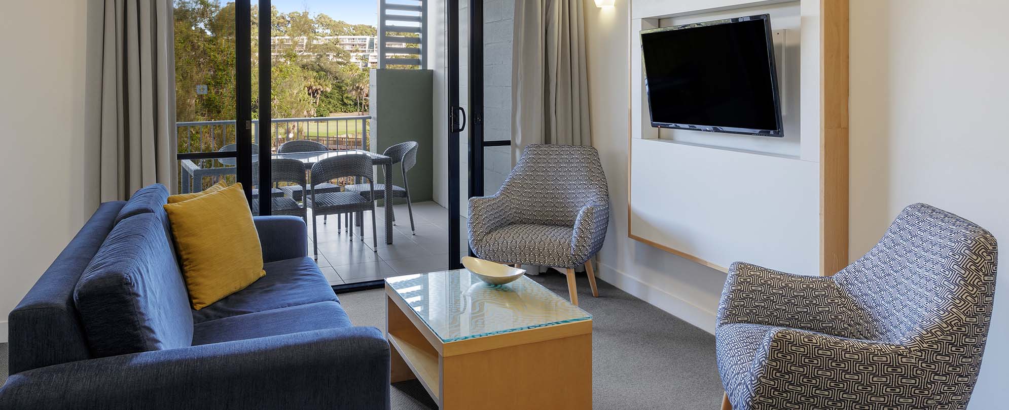 The living room of a 2-bedroom suite at Club Wyndham Coffs Harbor.