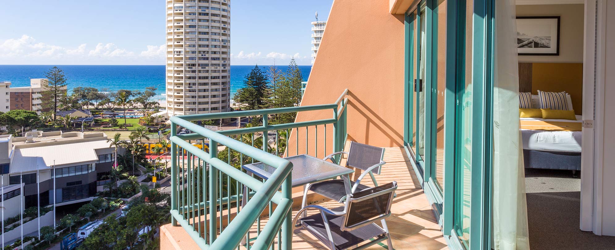 The balcony of a Club Wyndham Crown Towers 1-bedroom suite, overlooking the city and ocean in Surfer's Paradise, QLD.