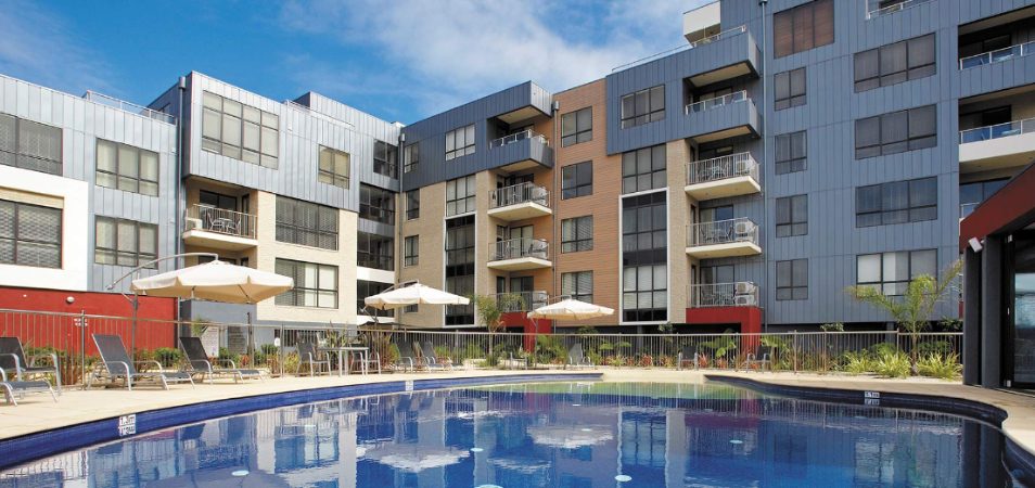 The pool and modern exterior of Club Wyndham Lakes Entrance, a timeshare resort in Victoria, Australia 