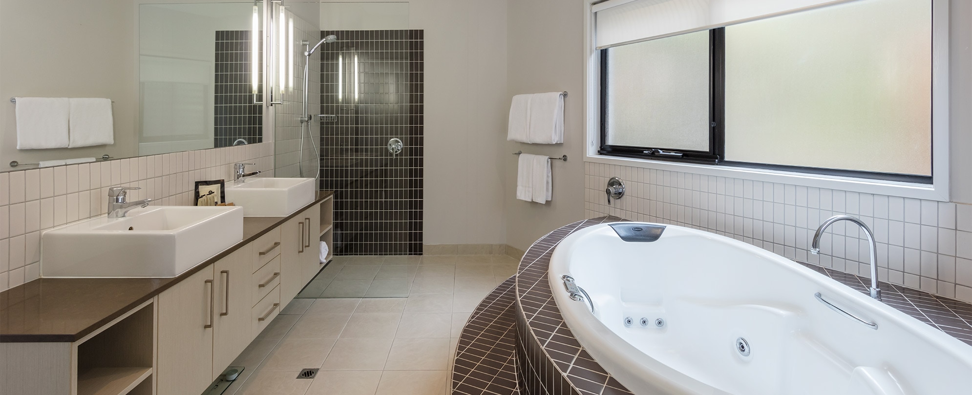 The master bathroom of a presidential reserve suite at Club Wyndham Seven Mile Beach.