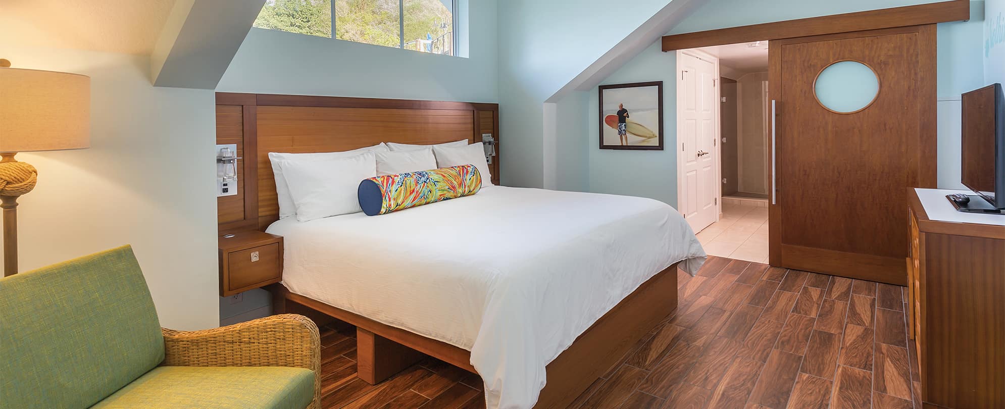 Crisp white linens on a resort bed in a suite at Margaritaville Vacation Club by Wyndham - St. Thomas.