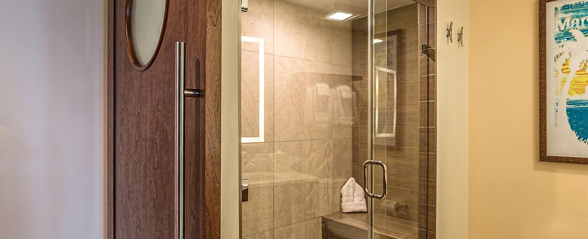 Shower with glass door in a studio suite at Margaritaville Vacation Club by Wyndham - St. Thomas.