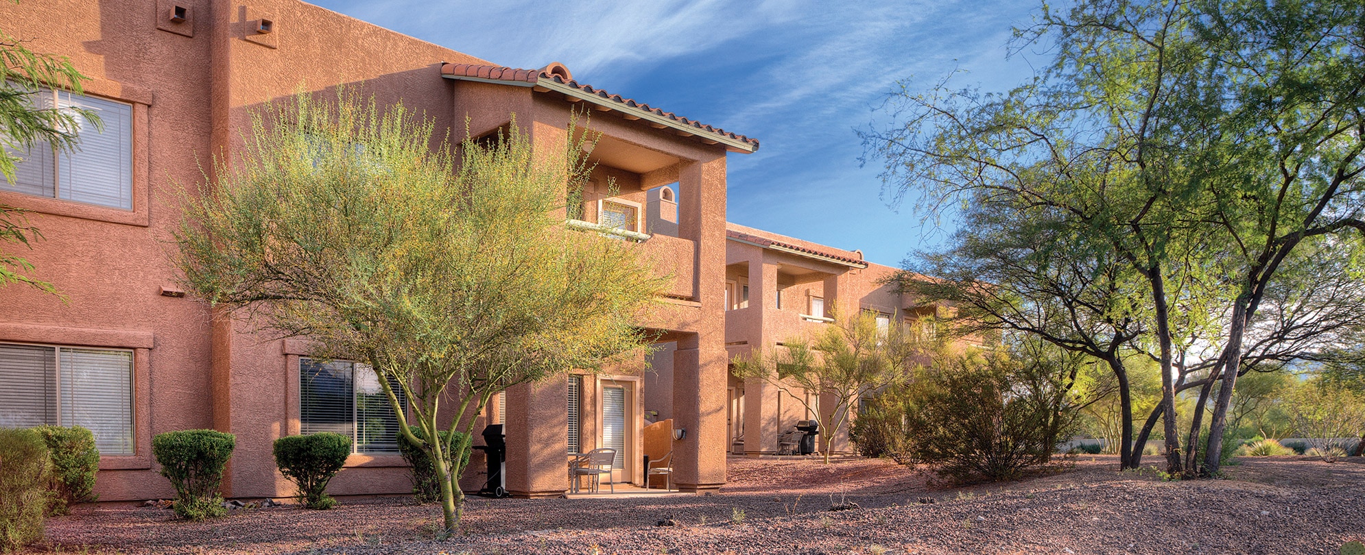 The exterior of Rancho Vistoso, a timeshare resort in Oro Valley, Arizona with spacious suites perfect for a desert vacation.