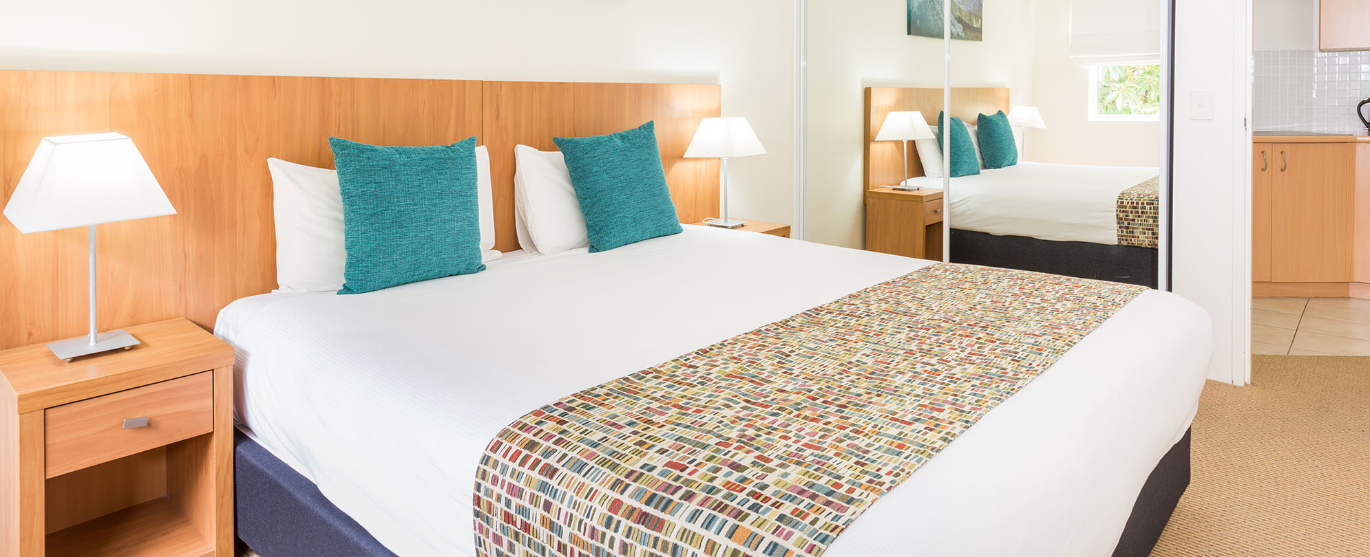 A king-sized bed in a studio suite at Club Wyndham Shoal Bay.