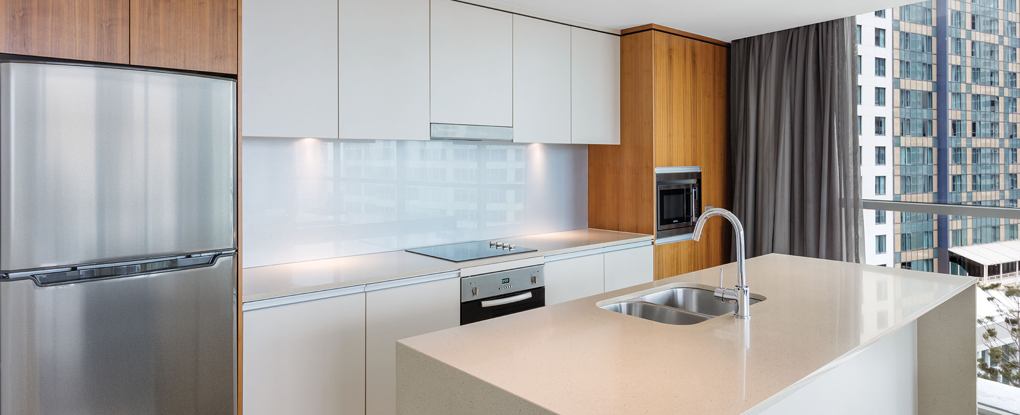 The kitchen of a 2-bedroom suite at Club Wyndham Surfers Paradise.