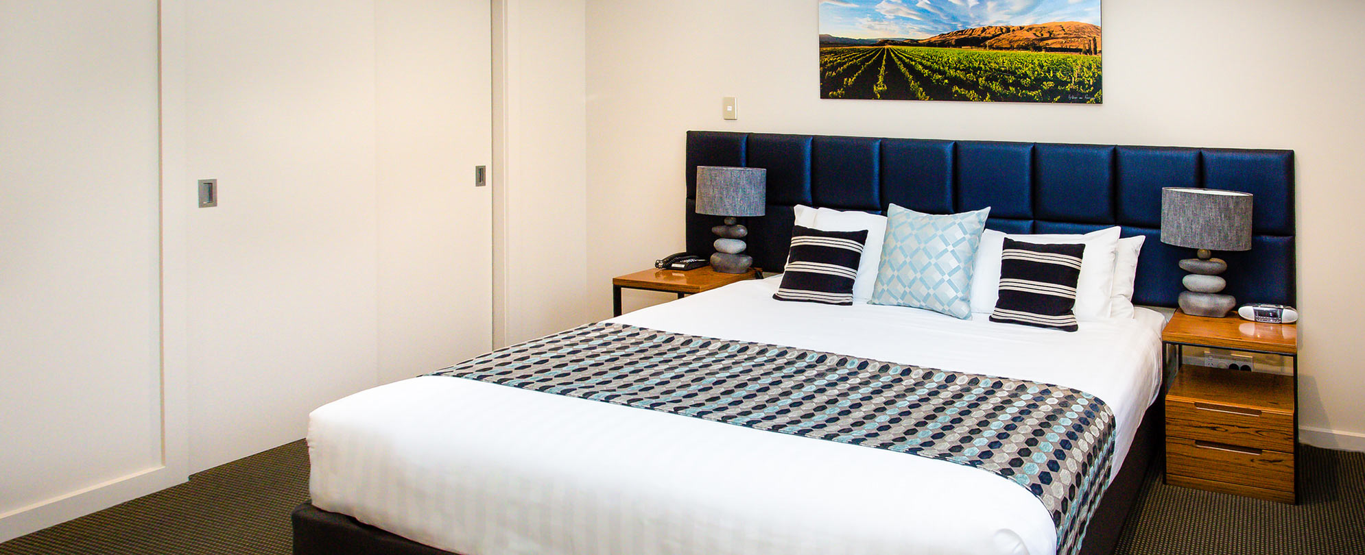 The bedroom of a standard suite at Club Wyndham Wanaka.