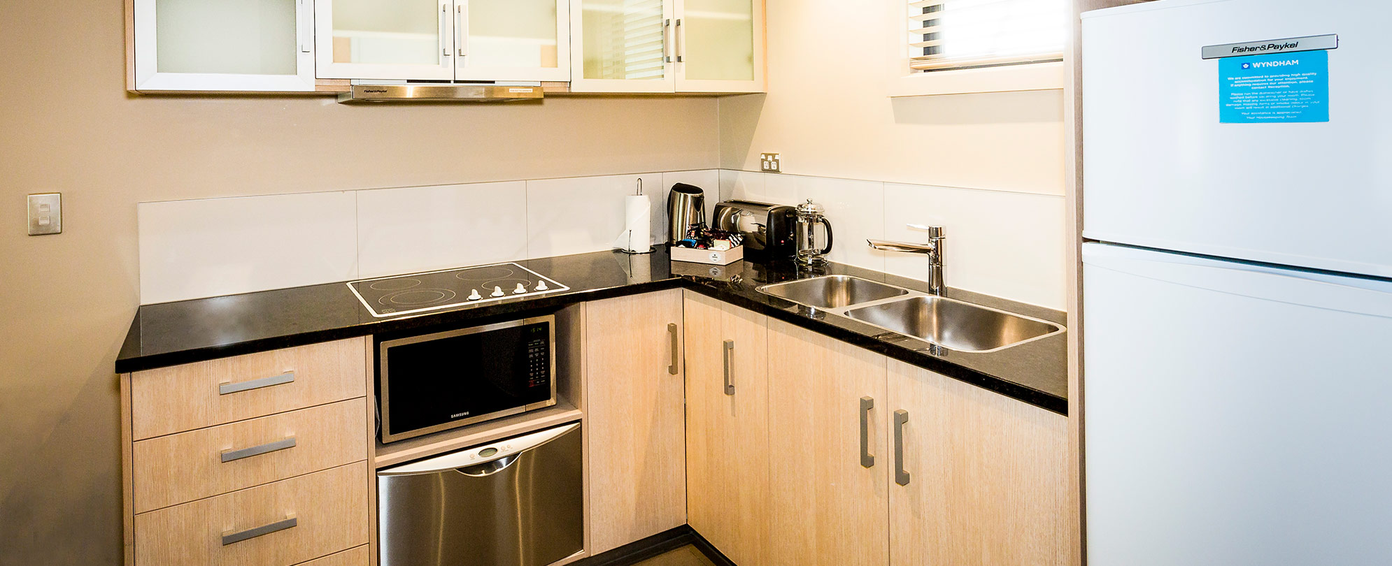 The kitchen of a 3-bedroom suite at Club Wyndham Wanaka.