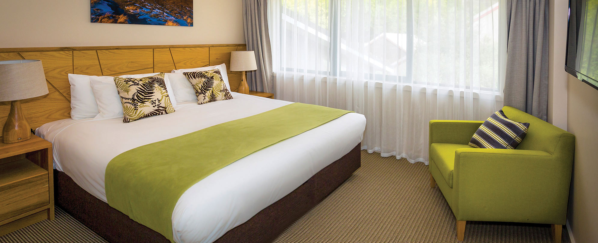 The master bedroom of a 3-bedroom suite at Club Wyndham Wanaka.