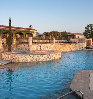 The outdoor pool and hot tub at WorldMark Stablewood Springs, a timeshare resort in Hunt, Texas.