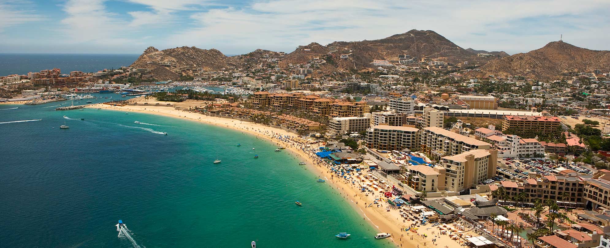 A bird's-eye view of El Medano Beach in Cabo San Lucas, a stop on a Mexican Riviera cruise.