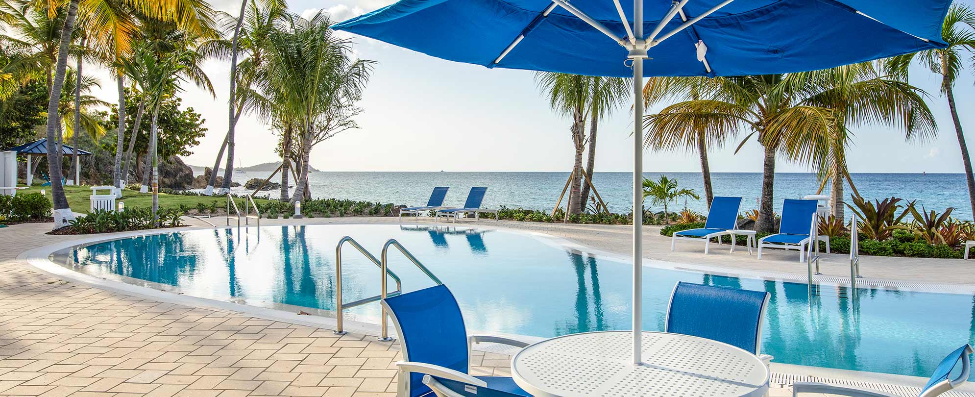 A WorldMark by Wyndham resort-style pool that overlooks beach views.