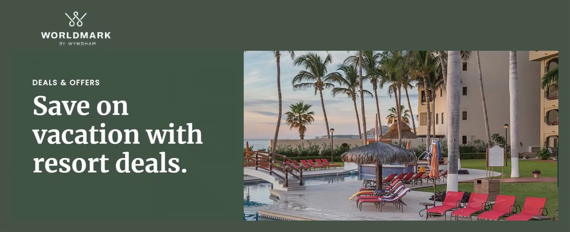 Palm trees around a pool with straw huts overlooking water with Worldmark by Wyndham.